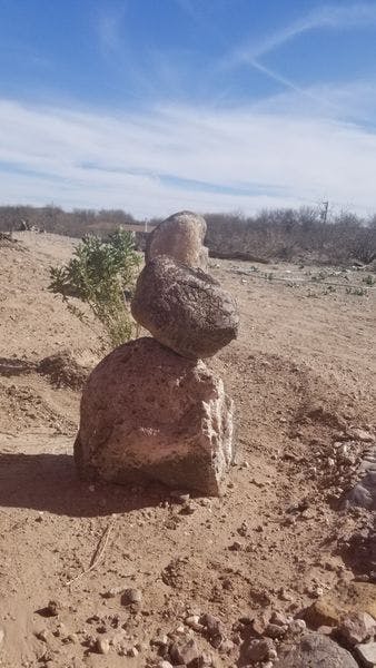 This cairn can be found somewhere on our property.
